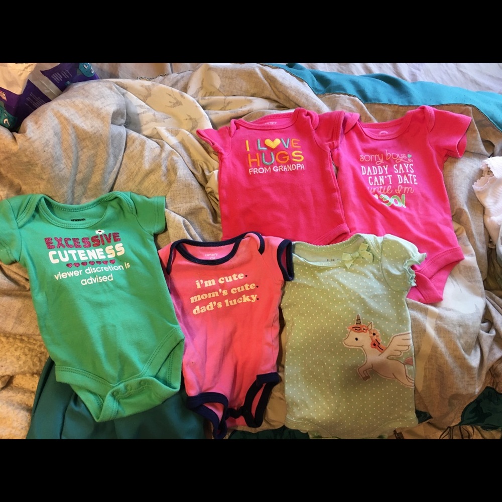 Gently used newborn baby girl onesies